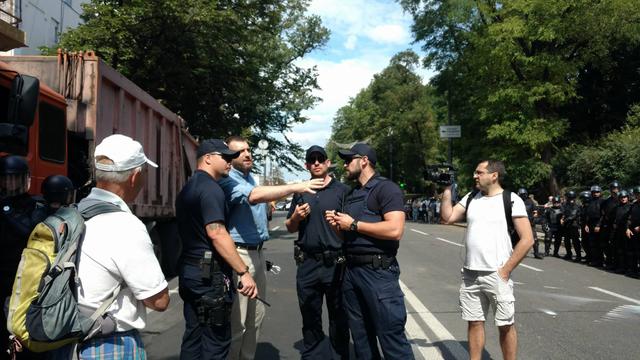 Protesters clash with police near Rada building 23