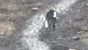 Soldier of "second army of world" who was walking with two bags on field road and was killed by Ukrainian drone. VIDEO