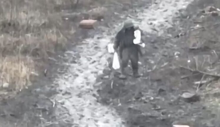Soldier of "second army of world" who was walking with two bags on field road and was killed by Ukrainian drone. VIDEO