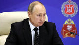путін