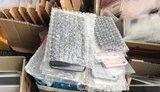 Партия мобильных телефонов, комплектующих и аксессуаров к ним почти на 6 млн грн изъята из незаконного оборота в Киеве. ФОТОрепортаж
