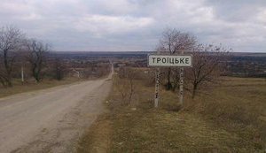 Террористы осуществили огневой налет из 152-мм артиллерии на Троицкое: повреждены жилые дома, - штаб ООС