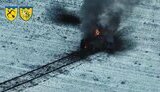 an armored vehicle is on fire