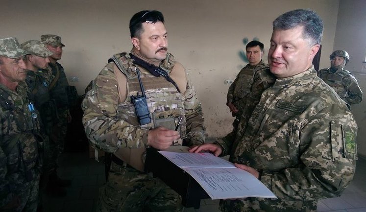 Poroshenko signed decree on fifth wave of demobilization on front line near Donetsk airport. PHOTOS