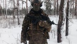 лев
