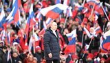 путін