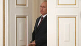 путін