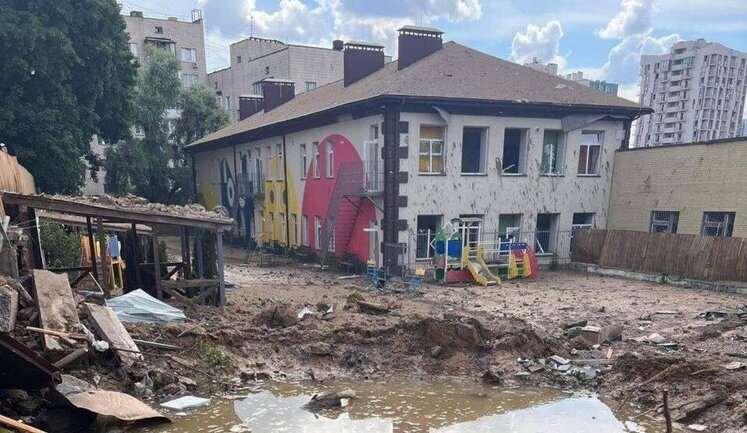 Pit from enemy missile hitting playground near kindergarten in Kyiv. PHOTO