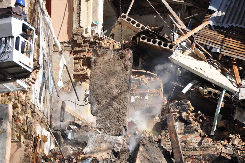 At site of kamikaze drone attack in Kyiv, rubble is being cleared 12