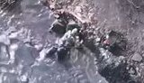 wounded Russian lying in puddle