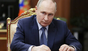 путін