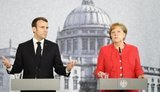 Меркель і Макрон закликали Путіна просунути переговори в нормандському форматі, - Зайберт