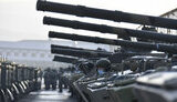 росія