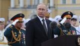путін