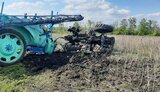 трактор,міна