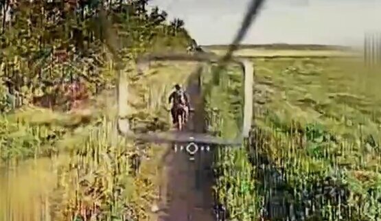 Drone attacks occupier on motorcycle