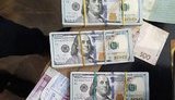 Подполковник полиции задержан на Кировоградщине на взятке 10 тыс. грн, при обыске в кабинете обнаружены 56 тыс. долл., - Нацполиция. ФОТО