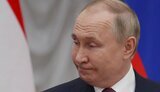 путін