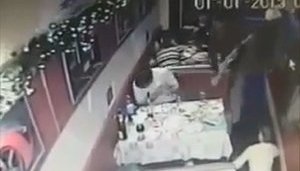 Celebrating New Year's Eve? Get knocked down with a rifle butt!: Terrorists beat up café visitors in Alchevsk. VIDEO