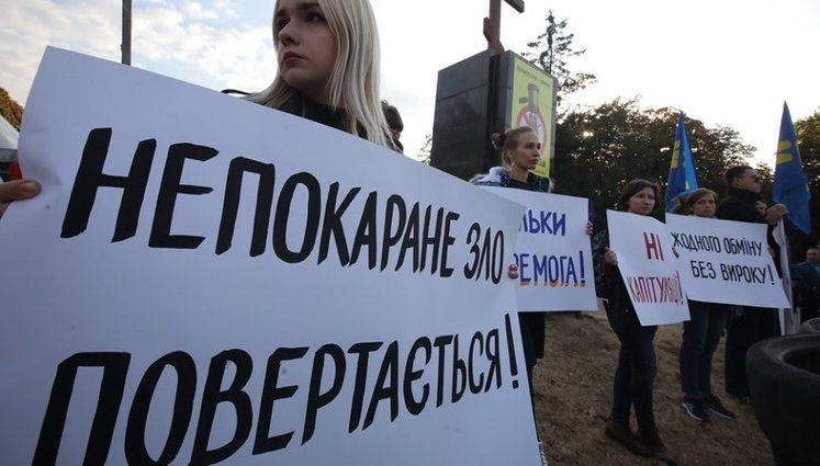 "Непокаране зло повертається", - у Харкові протестували проти обміну обвинувачених у теракті біля Палацу спорту. ФОТОрепортаж