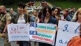 Переселенці під Кабміном протестували проти нової системи нарахування соцвиплат для біженців. ФОТОРЕПОРТАЖ