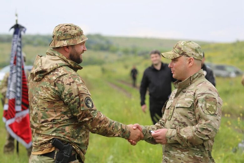 Гостіщев з колегою