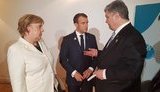 Порошенко проводить переговори з Меркель і Макроном у зв