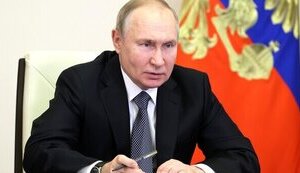 путін