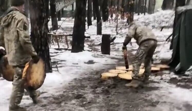 Fighter jokes about his comrades who are setting up camp in forest: "There is war in Ukraine, and they are laying paving stones. Do you have any shame? It would be better to buy drones.". VIDEO