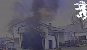 Occupiers had hidden self-propelled artillery piece in hangar amongst civilian equipment, but drone operators from "Dovbush’s Hornets" unit destroyed it. VIDEO