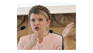 Тимошенко считает, что если "Наша Украина" не подписала ее соглашение, значит они ведут переговоры с "Регионами"