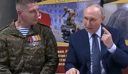 путін і уцілілий окупант