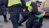 Odesa policeman beats woman