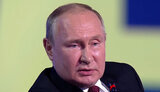 путін