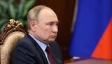 путін