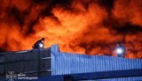 Россияне атаковали беспилотником пригород Харькова: на складе возник пожар. ФОТОРЕПОРТАЖ