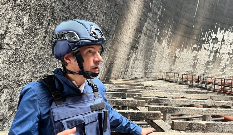 IAEA Director General Grossi visits Zaporizhzhia NPP and assesses situation at cooling tower after fire. PHOTOS