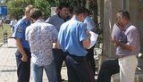 В центре Донецка средь бела дня двое в шапочках ку-клукс-клана ограбили банк. ФОТОрепортаж