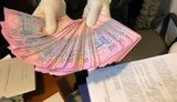 Під час одержання шести тисяч хабара затримано чиновника Дарницької РДА в Києві, - ГПУ
