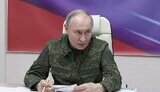 путін