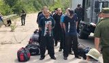 64 convicts transferred from occupied Donbas to government-controlled Ukraine. PHOTOS