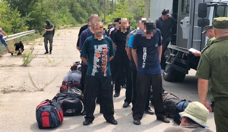 64 convicts transferred from occupied Donbas to government-controlled Ukraine. PHOTOS