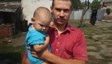 A Friend of the Party of Regions Local Leader Shot a Man Holding a Baby in His Hands. PHOTOS