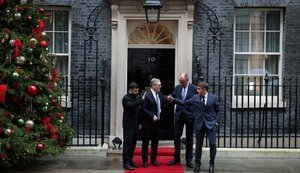 Merz and Macron left Downing Street after the brief meeting.