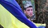 С погибшим в результате подрыва техники на взрывном устройстве воином 54-й бригады Дмитрием Беляевым простились в Запорожской области. ФОТОрепортаж