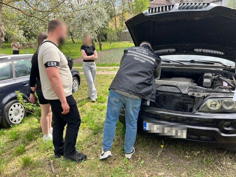 Law enforcement officers have uncovered a scheme to import and sell vehicles under the guise of aid to the army