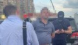 На взятке 15 тыс. долл. задержан мужчина, обещавший решить земельный вопрос через КГГА и Киевсовет, - СБУ. ФОТО