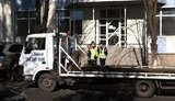 В Донецке дорогу Януковичу расчищают эвакуаторы: "Результаты достойны доверия". ФОТОрепортаж