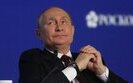путін