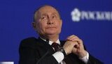 путін